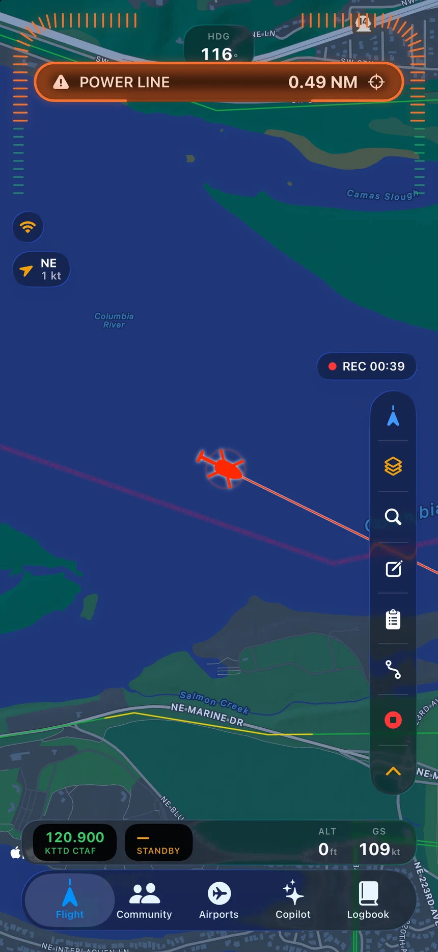 A live POWER LINE alert on the Lateral map at 0.49 nautical miles: the ownship turns red, the span ahead is highlighted, and the alert arc lights on the side the hazard is on.